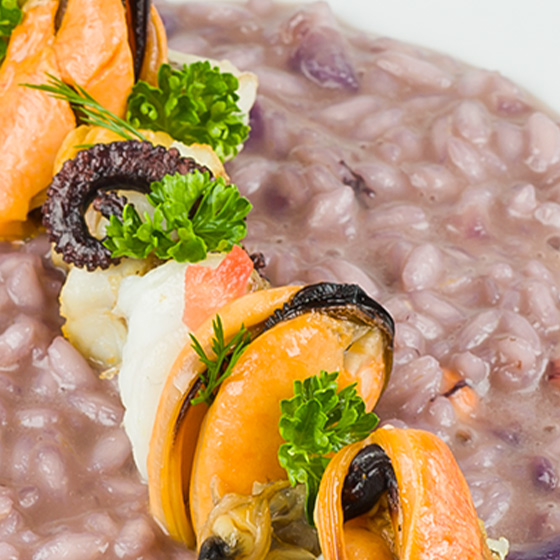 Risotto al cavolo nero con bouquet di pesce