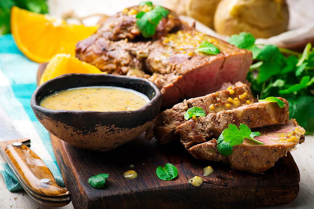 Una variante valida all’arrosto tradizionale è la cottura con salsa di agrumi